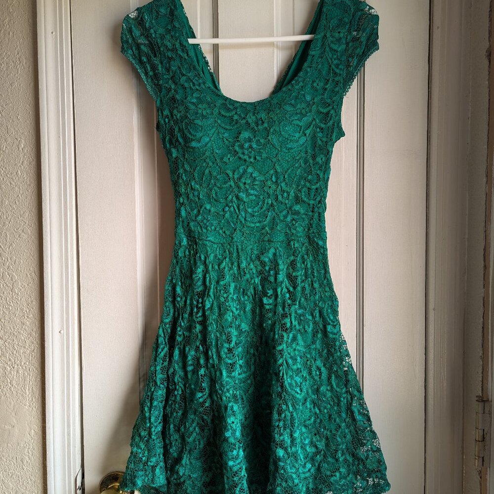 Emerald green cross back skater dress